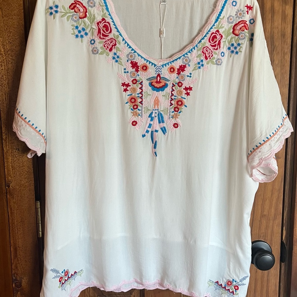 White blouse with embroidery